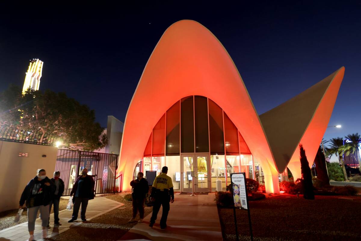 People enter the Neon Museum in downtown Las Vegas Sunday, Dec. 5, 2021. (K.M. Cannon/Las Vegas ...