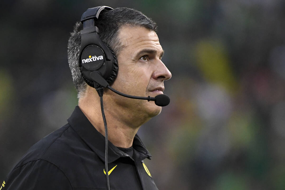 Oregon head coach Mario Cristobal watches his team during the fourth quarter of an NCAA college ...