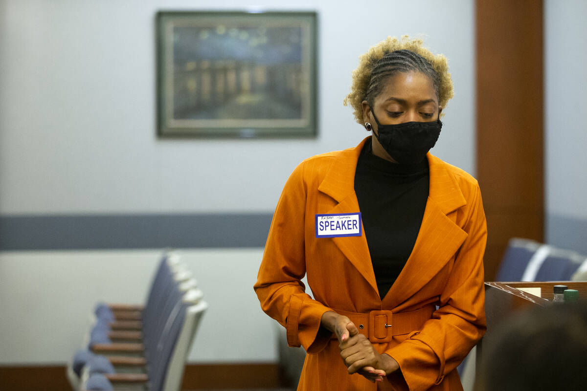 Rayven Thomas, who was shot by her ex-boyfriend Leroy Mack in July, returns to her seat after s ...