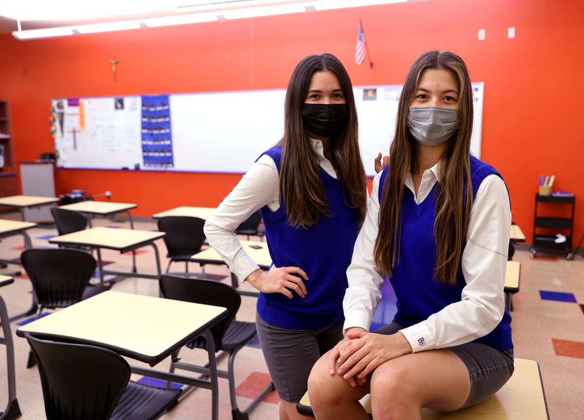 Bishop Gorman students Caroline Edgeworth, a senior, left, and her sister, Lauren, a junior, at ...