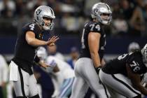 Raiders quarterback Derek Carr (4) calls an audible in the first half during an NFL football ga ...