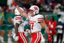 Houston Cougars wide receiver Jake Herslow gestures after scoring against South Florida during ...