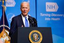 President Joe Biden speaks about the COVID-19 variant named omicron during a visit to the Natio ...