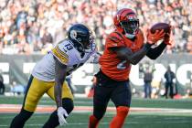 Cincinnati Bengals cornerback Mike Hilton (21) returns an interception for a touchdown during a ...