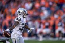 Raiders' cornerback Nate Hobbs (39) celebrates his interception over the Denver Broncos during ...