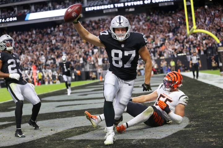 Las Vegas Raiders tight end Foster Moreau (87) makes a touchdown catch under pressure from Cinc ...