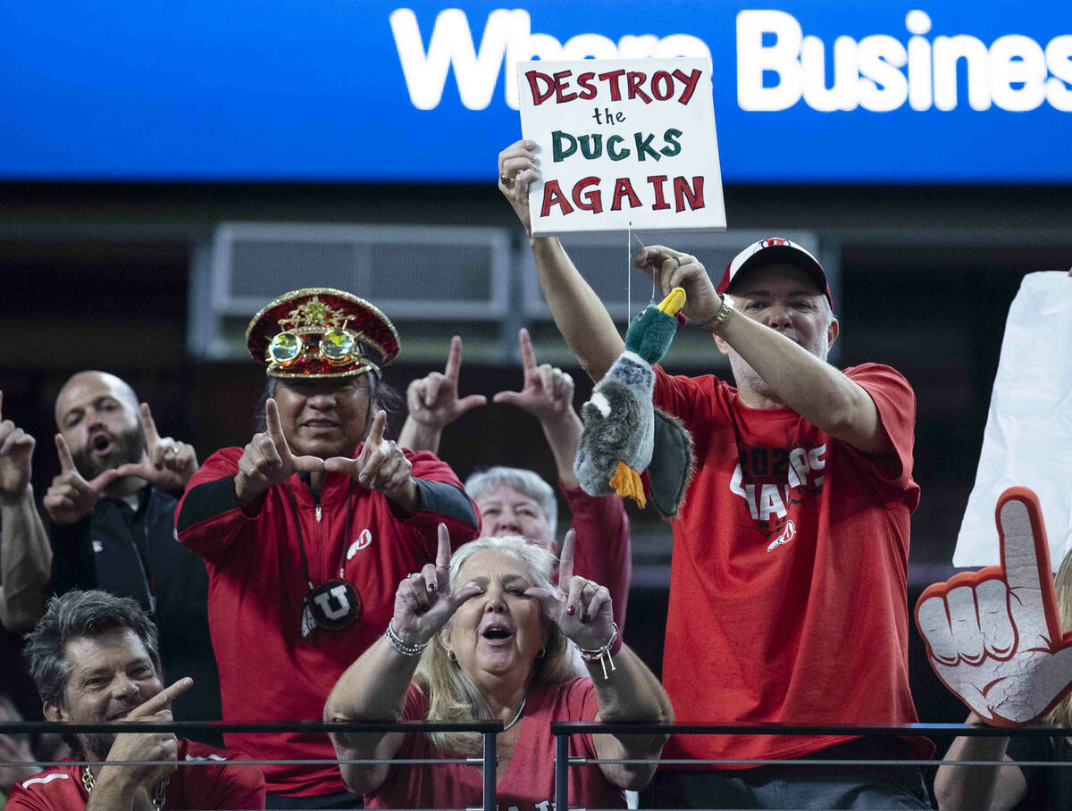 Utah Utes fans celebrate after their team beat Oregon Ducks 38-10 during the Pac-12 championshi ...