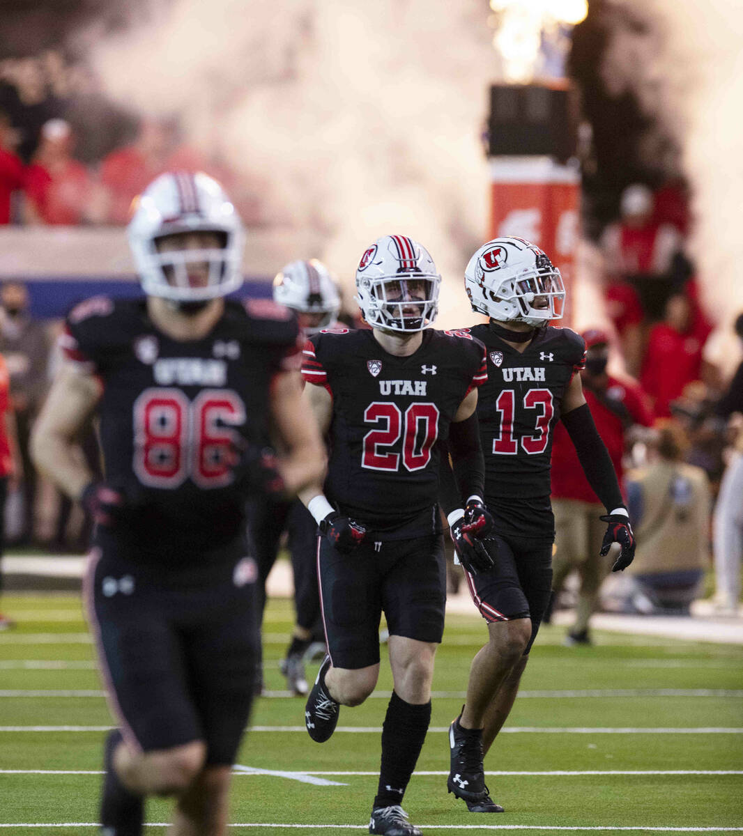 Utah Utes players take the field to face Oregon Ducks during the first half of the Pac-12 champ ...