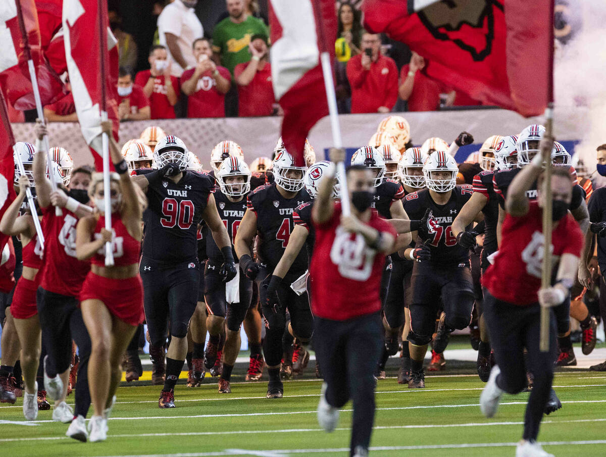 Utah Utes players take the field to face Oregon Ducks during the first half of the Pac-12 champ ...
