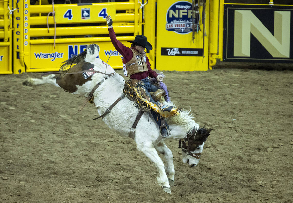 Tegan Smith of Winterset, Iowa, rides Lunatic Party during the opening night of Wrangler Nation ...