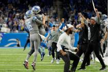 The Detroit Lions celebrate their last-second, come-from-behind win over the Minnesota Vikings ...