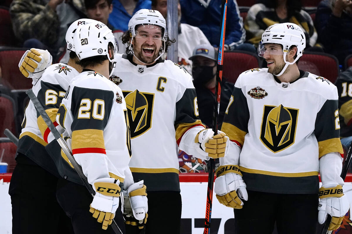 Vegas Golden Knights left wing Max Pacioretty, left, celebrates his goal against the Arizona Co ...