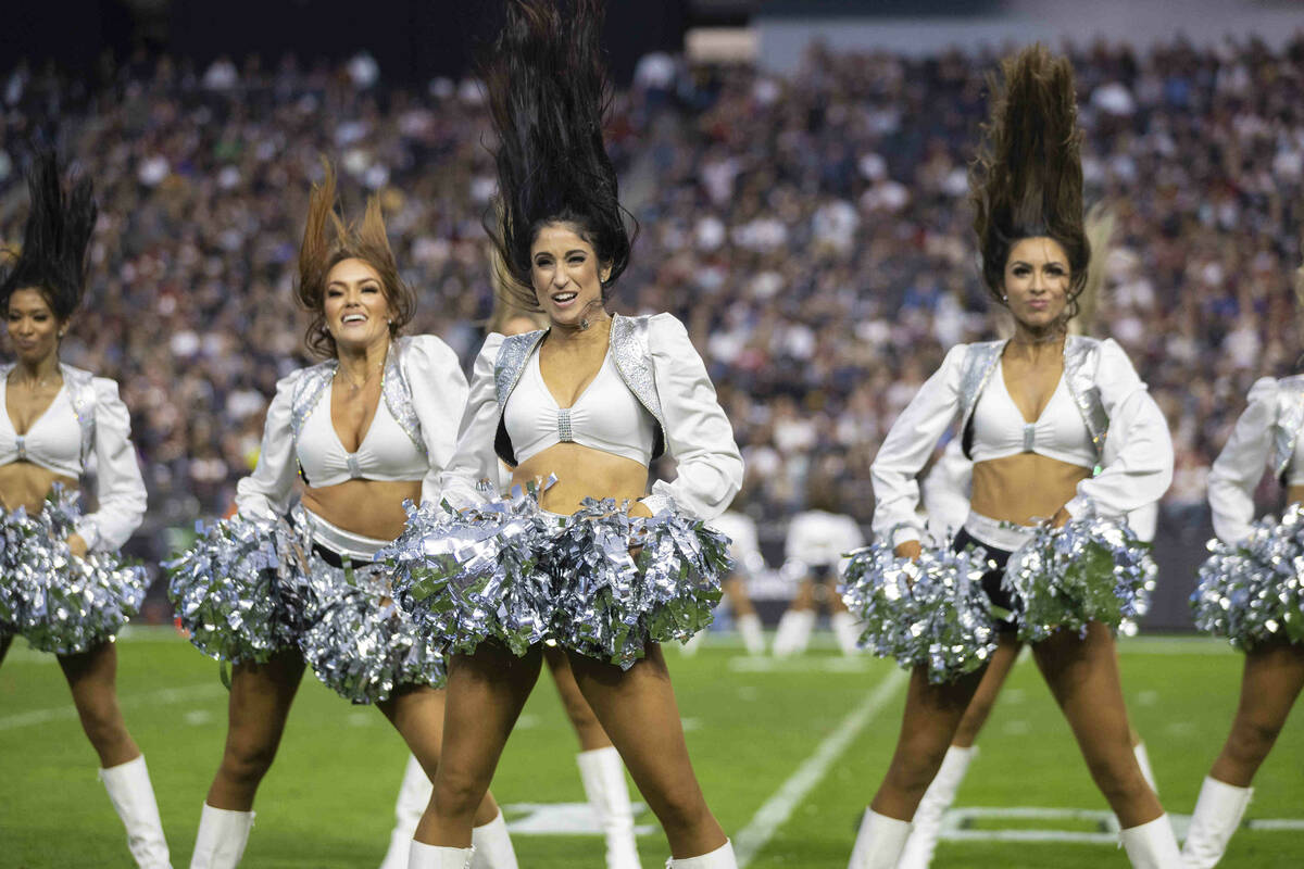 The Raiderettes perform in the second half of an NFL football game against the Washington Footb ...
