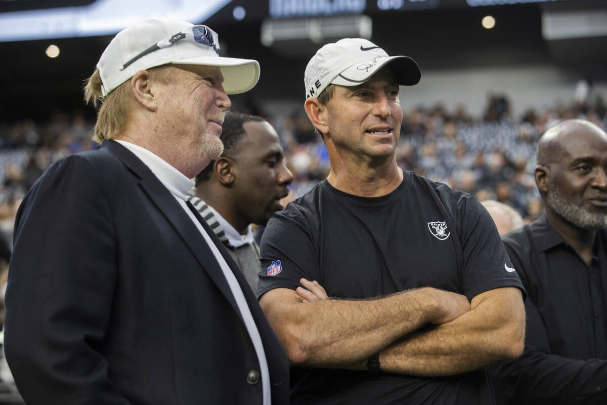 Clemson head football coach Dabo Swinney, right, talks with Raiders owner Mark Davis before the ...