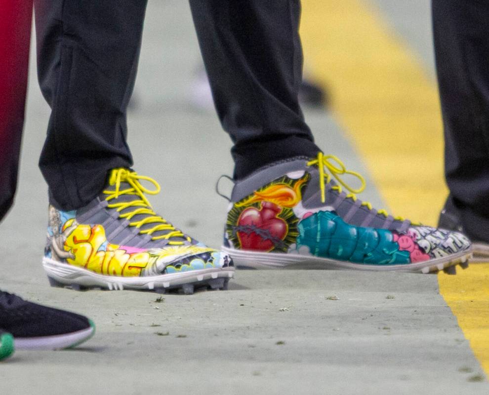 Raiders tight end Darren Waller (83) wears his My Cause My Cleats on the sideline during the se ...