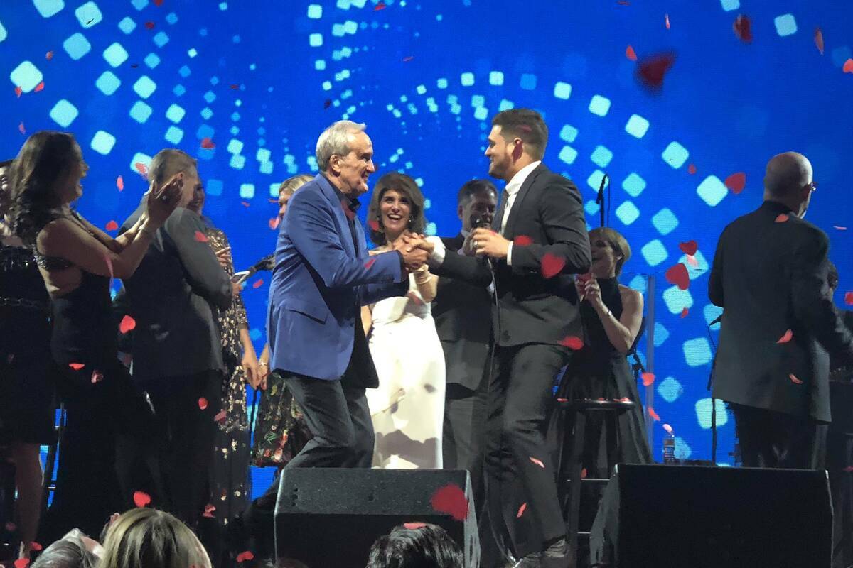 Michael Buble is amusement   with Larry and Camille Ruvo astatine  22nd Keep Memory Alive Power of Love gala ...
