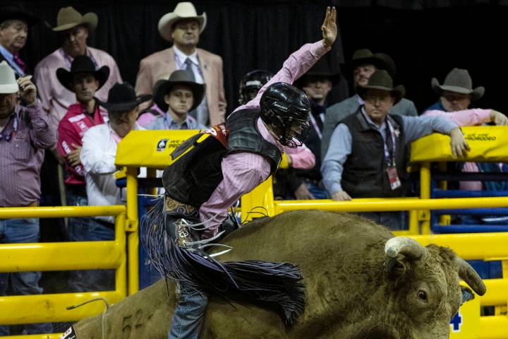 Creek Young of Rogersville, Mont., rides CliffHanger during the fifth round of the Wrangler Nat ...