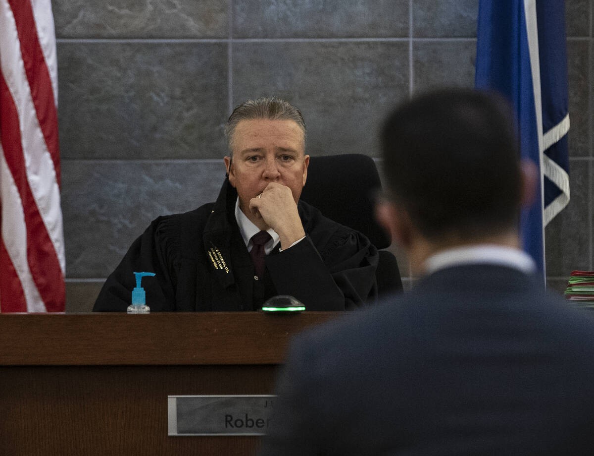 Judge Robert Walsh listens as attorney Richard Schonfeld, representing former Raiders wide rece ...