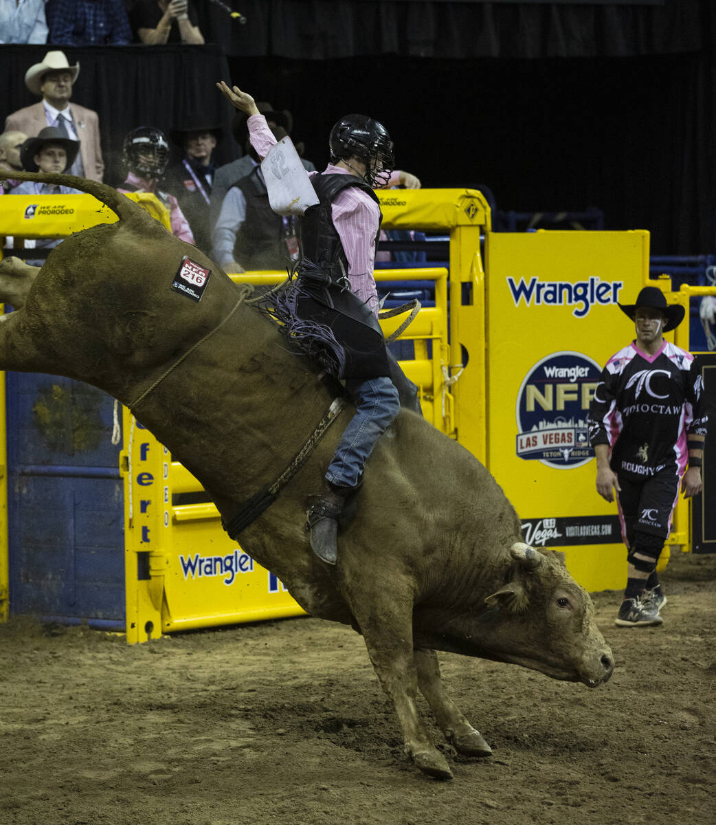 Creek Young of Rogersville, Mont., rides CliffHanger during the 5th  circular  of the Wrangler Nat ...