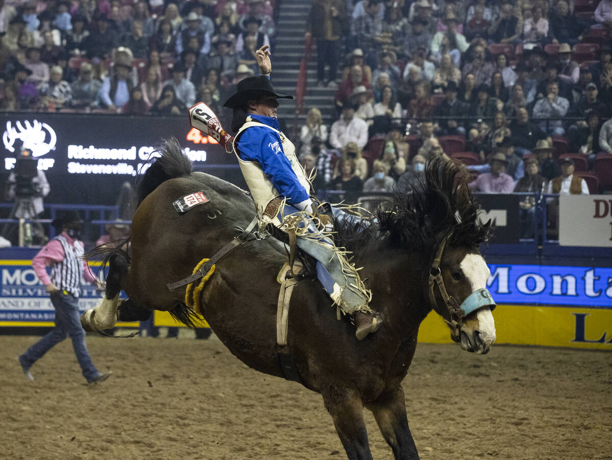 Richmond Champion of Stevensville, Mont., rides Faded Night successful  Bareback Riding during the 5th  ...