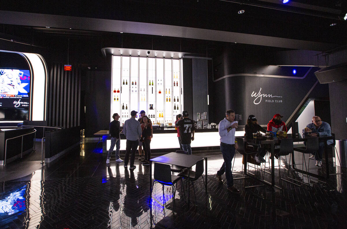 A view of a bar area at the Wynn Field Club before the start of an NFL game between the Raiders ...
