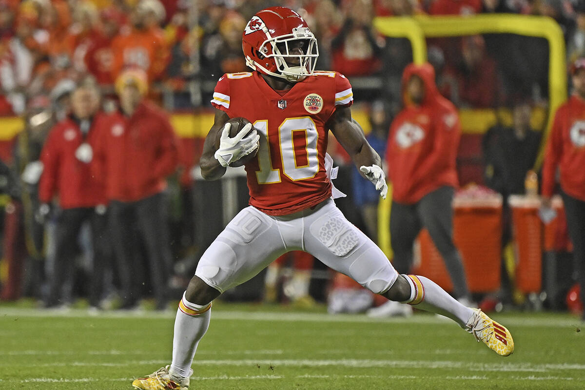 Kansas City Chiefs wide receiver Tyreek Hill (10) runs up field after catching a pass during an ...