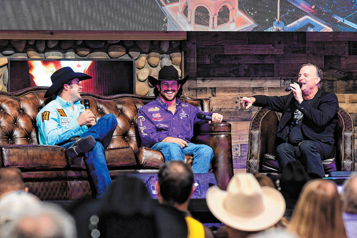 Outside the Barrel host Flint Rasmussen, far right, talking with Wrangler NFR contestants, from ...