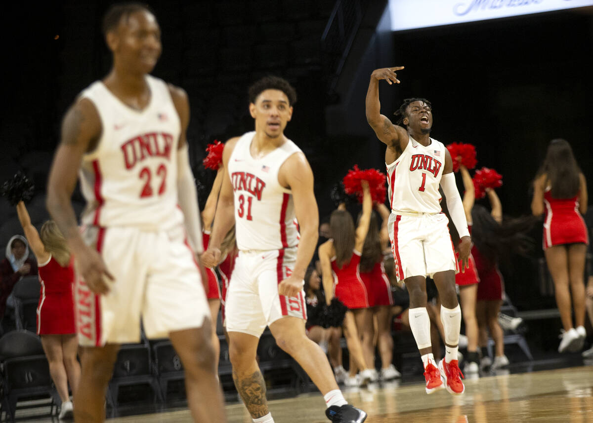 UNLV Rebels guard Michael Nuga (1) celebrates after shooting a three-pointer during the second ...