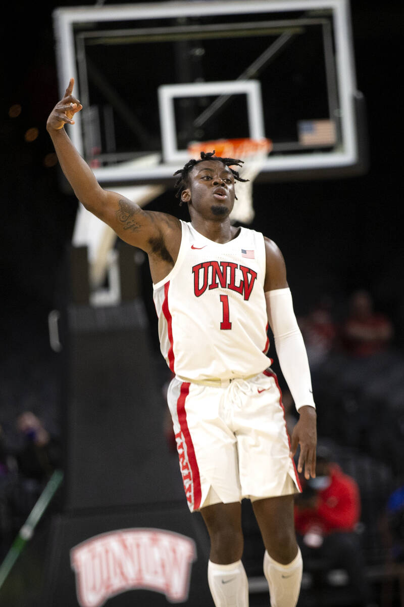 UNLV Rebels guard Michael Nuga (1) celebrates after shooting a three-pointer during the second ...