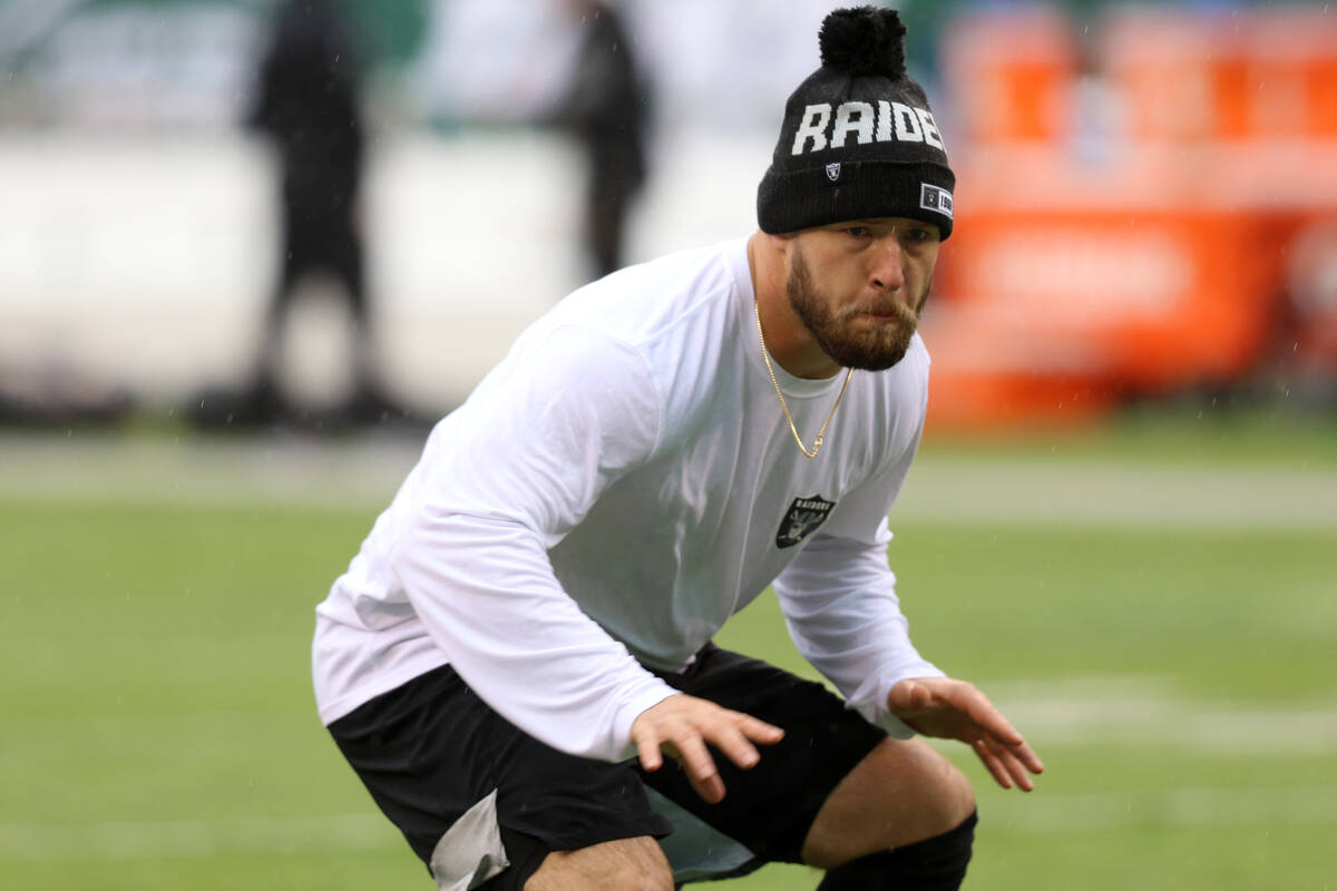 Oakland Raiders inside linebacker Will Compton works out on the field prior to an NFL game at a ...