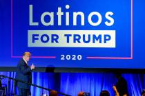 President Donald Trump give a thumbs up to the cheering crowd after a Latinos for Trump Coaliti ...