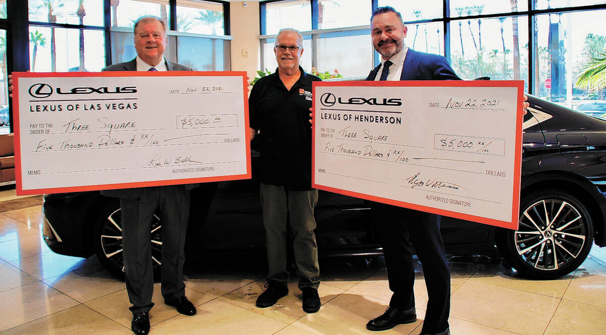 Lexus of Las Vegas Chief Operating Officer Lee Butler, left, and Lexus of Henderson General Man ...