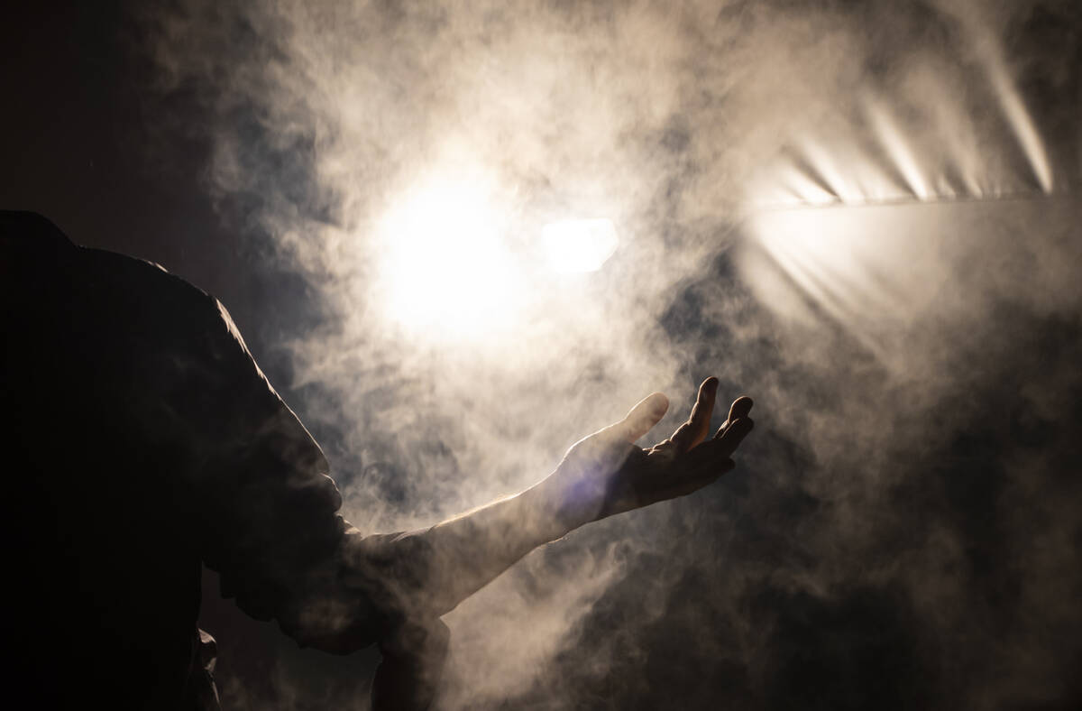 Valentino Vettori, founder of Arcadia Earth, reaches into mist while leading a tour through on ...