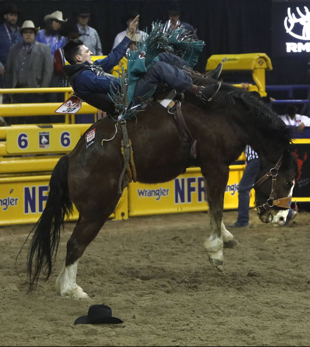 Jess Pope of Waverly, Kan.competes in the bareback riding event during the seventh go-round of ...