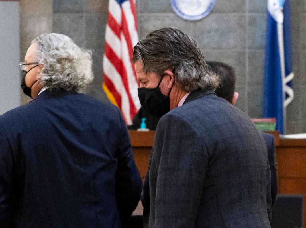 Attorney Peter Christiansen, right, representing Rudy Washington, the girlfriend of former Raid ...