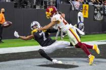 Raiders wide receiver Zay Jones (7) can’t haul in a pass as Washington Football Team cornerba ...
