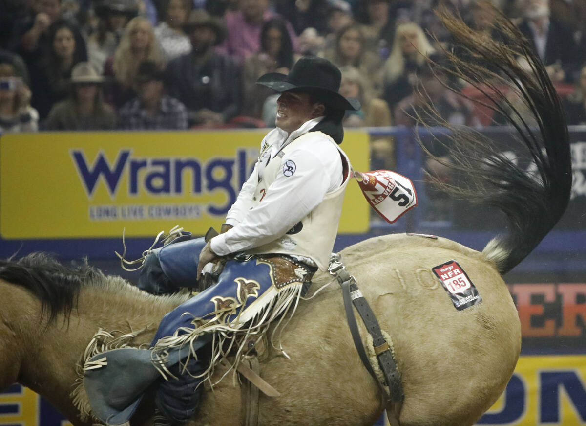 Richmond Champion of Stevensville, Mont. competes in the bareback riding event during the eight ...