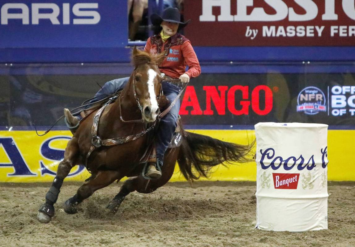 Jordon Briggs of Tolar Texas competes in the barrel racing event during the eighth go-round of ...