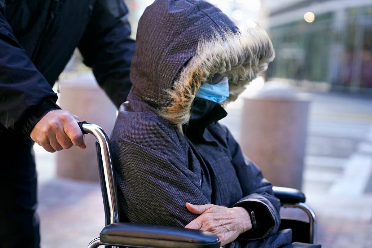 Elisabeth Kimmel, of Las Vegas, is wheeled into federal court for a sentencing hearing Thursday ...