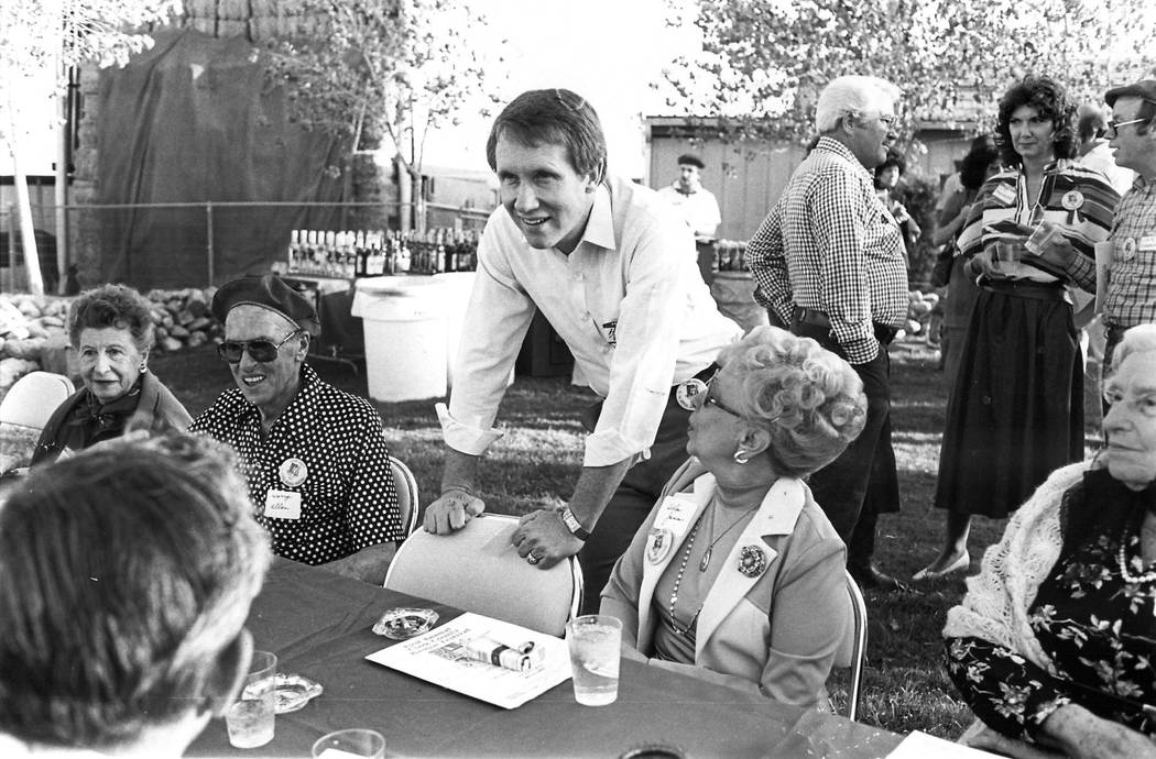 U.S. Senate candidate Harry Reid table-hops at the Basque Festival in 1982. (File Photo)