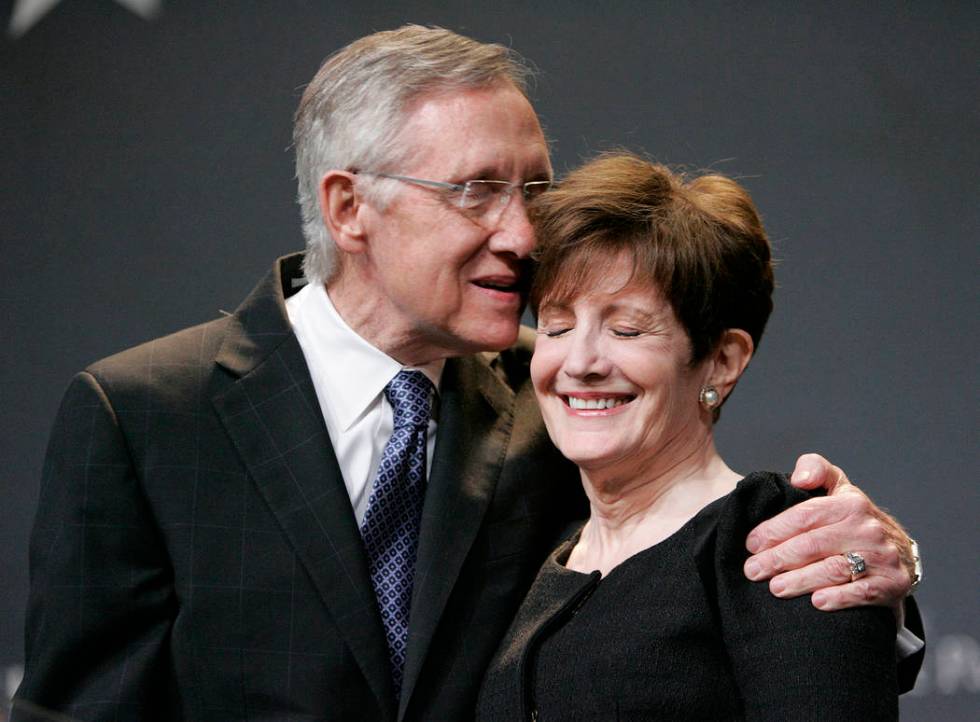 U.S. Sen. Harry Reid, D-Nev., celebrates with his wife, Landra, during an election night party ...