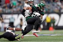 New York Jets running back Ty Johnson (25) runs against the Philadelphia Eagles during an NFL f ...