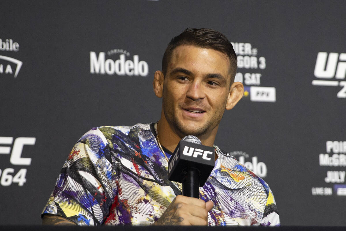 UFC lightweight Dustin Poirier answers questions during a news conference after defeating Conor ...