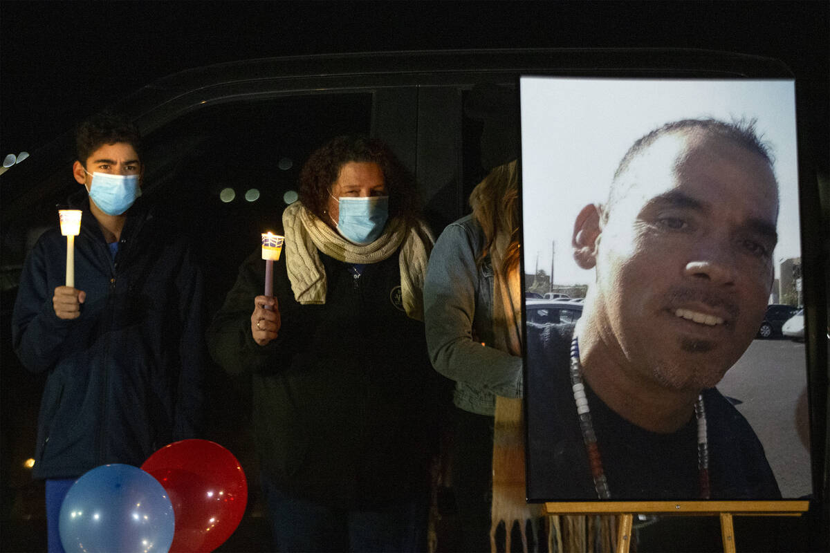 In this Jan. 3, 2021, file photo, Eric Echevarria Jr., left, and his mother, Annmarie Echevarri ...