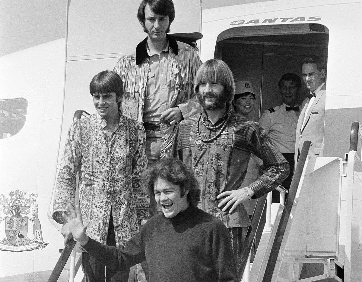 Members of The Monkees, clockwise from bottom center, Micky Dolenz, Davy Jones, Mike Nesmith an ...
