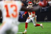 Kansas City Chiefs quarterback Patrick Mahomes looks to pass the ball during the second half of ...