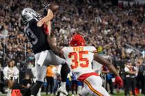 Raiders wide receiver Hunter Renfrow (13) makes a touchdown catch over Kansas City Chiefs corne ...