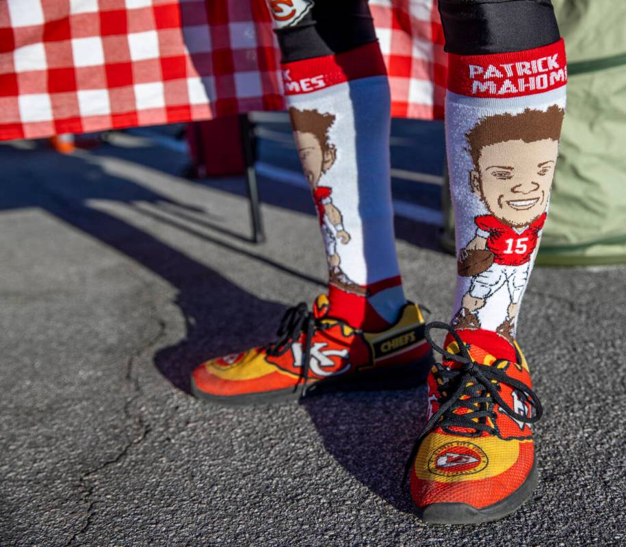 A Kansas City fan wears a pair of Patrick Mahomes socks in the red lot tailgate before the Raid ...