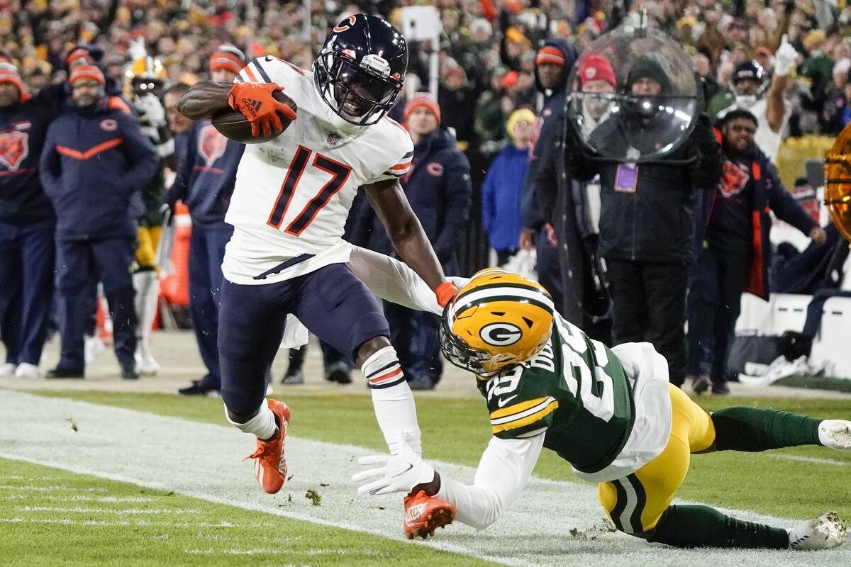 Chicago Bears' Jakeem Grant Sr. gets past Green Bay Packers' Rasul Douglas for a touchdown rece ...