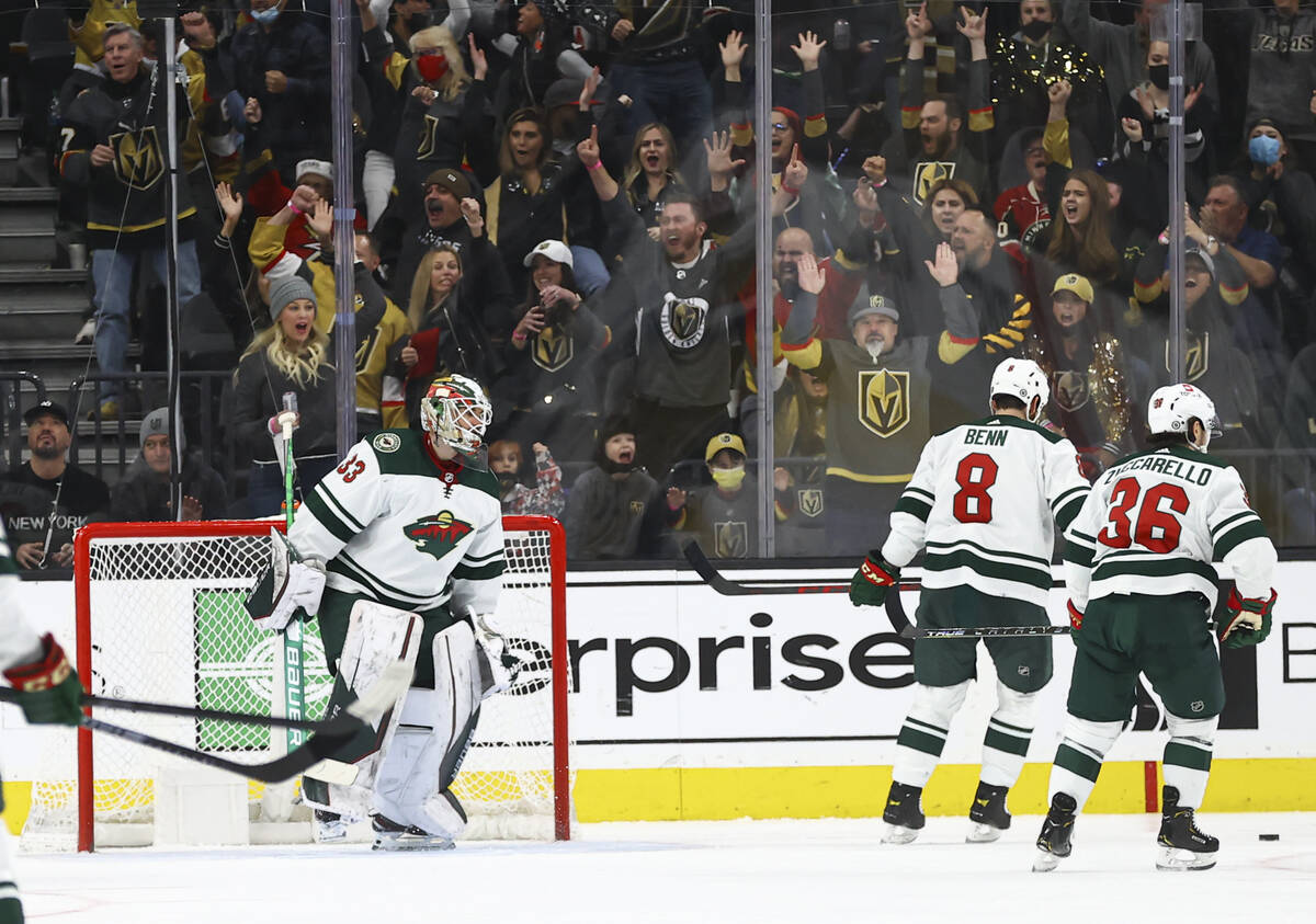 Golden Knights fans celebrate after a goal against the Minnesota Wild during the second period ...